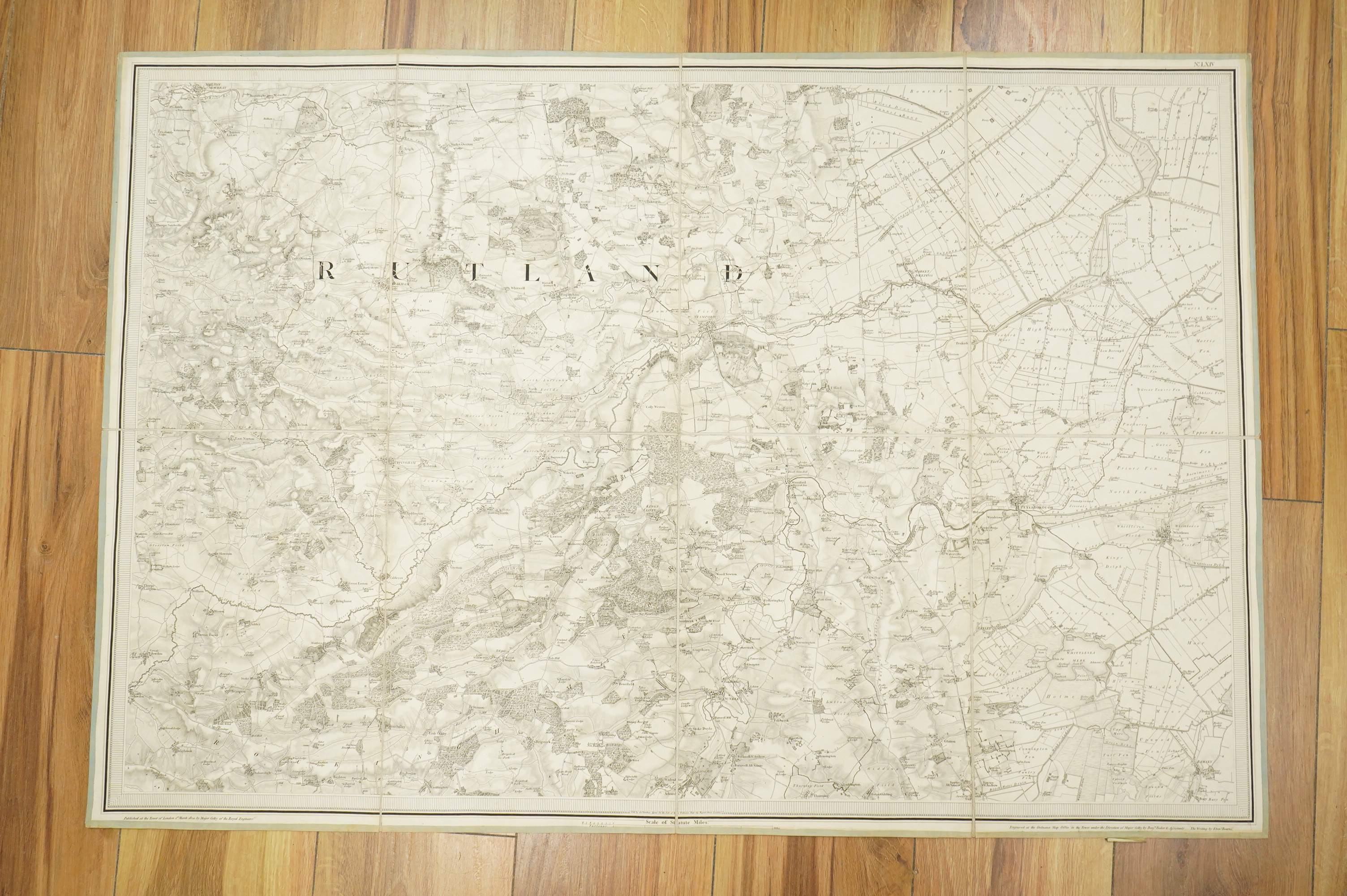 Ordnance Survey maps of Lincolnshire, Rutlandshire, N. Huntingdonshire and W. Norfolk &c., comprising of a set of eight engraved maps mounted on linen and edged in green cotton, including sheet no.s; 64, 65, 69, 70, 83,